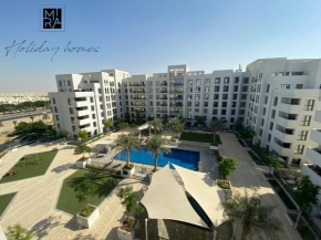 Mira Holiday Homes - Lovely 2 bedroom apartment with pool in Town Square